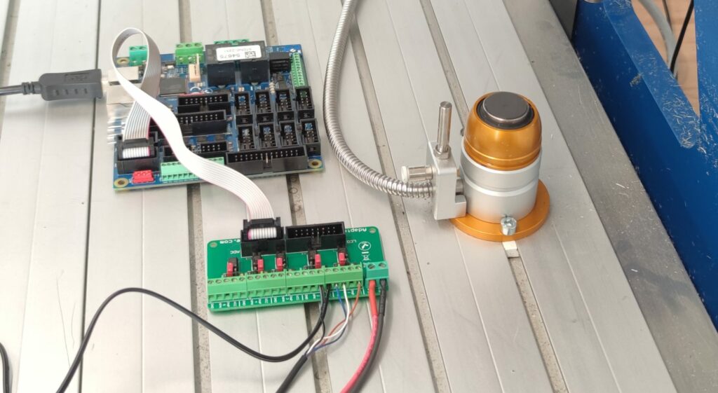 PoKeys57CNC connected to AdapterPNPN board to which probe and tool setter are connected.