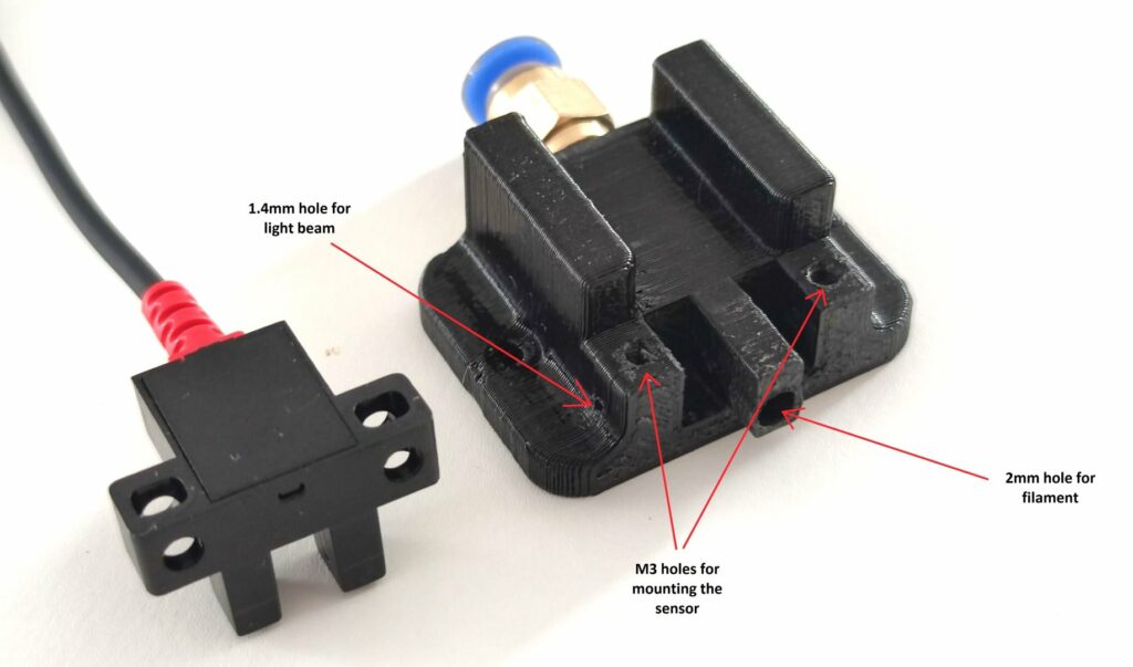 DIY filament sensor with homing sensor and 3D printed part that guides the filament