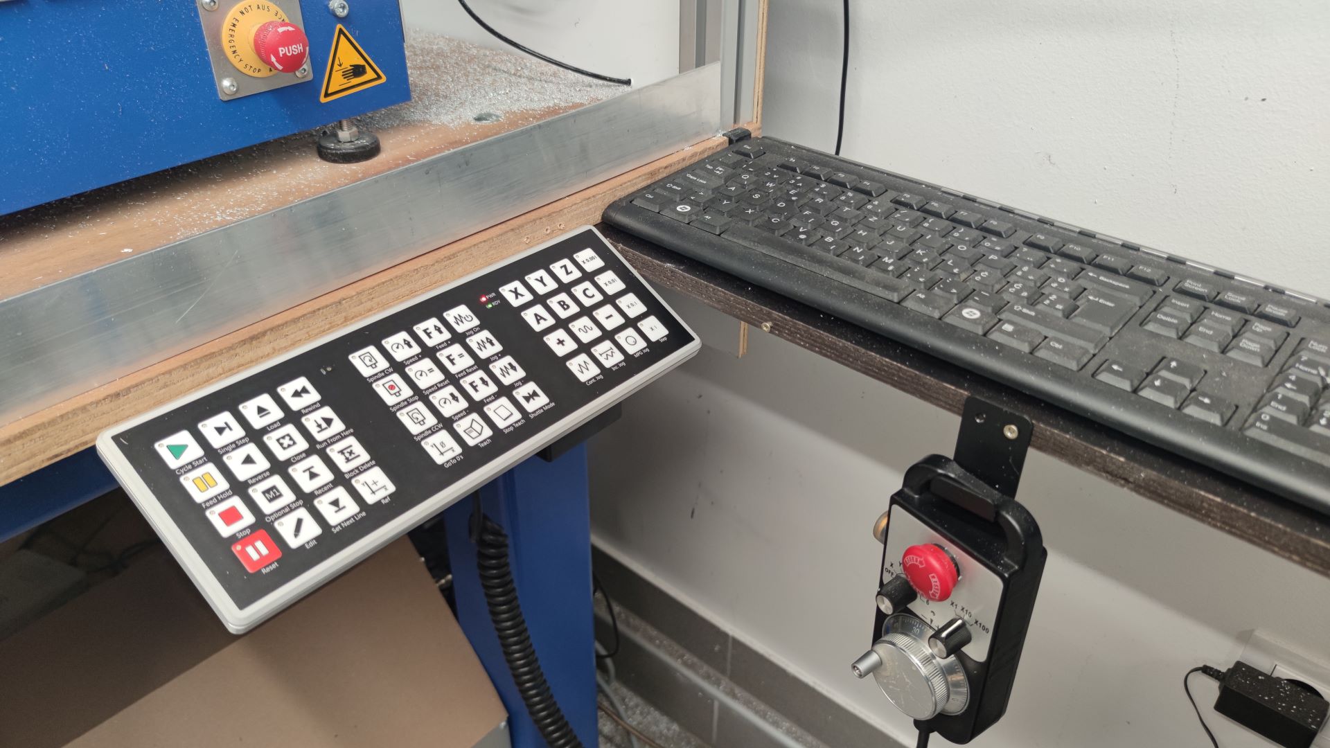 CNC machine keyboard mounted on our CNC machine